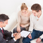 Consultant Showing Agreement To Couple © apops - Fotolia.com